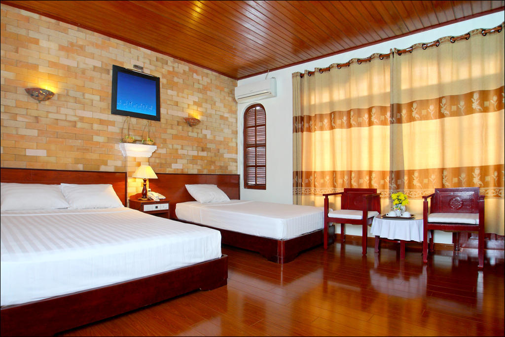 Nhi Trung Hotel Hoi An Habitación foto