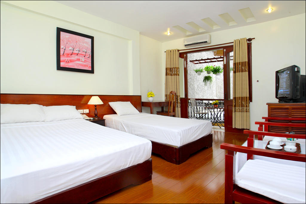 Nhi Trung Hotel Hoi An Habitación foto